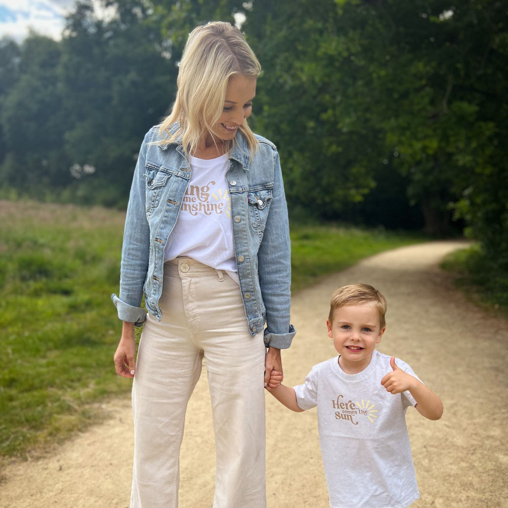 "Bring Me Sunshine" shirt for mothers paired with a kids "Here comes the sun" shirt is the perfect summer staple. Who doesn't love a good mama and me matching moment.