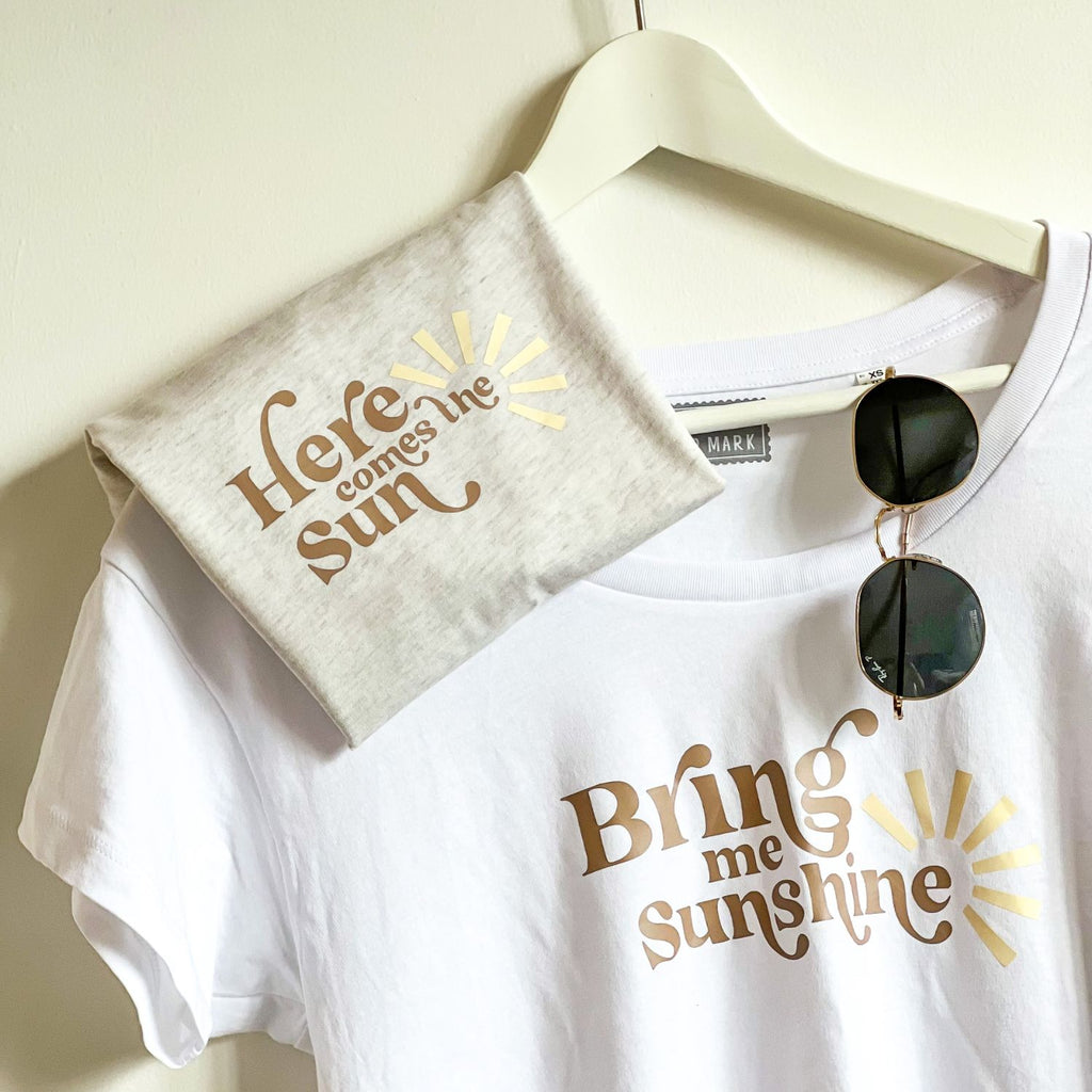 Mama and Me sunshine shirts. Mother shirts reads, "Bring me Sunshine" and the kids reads "Here comes the sun"