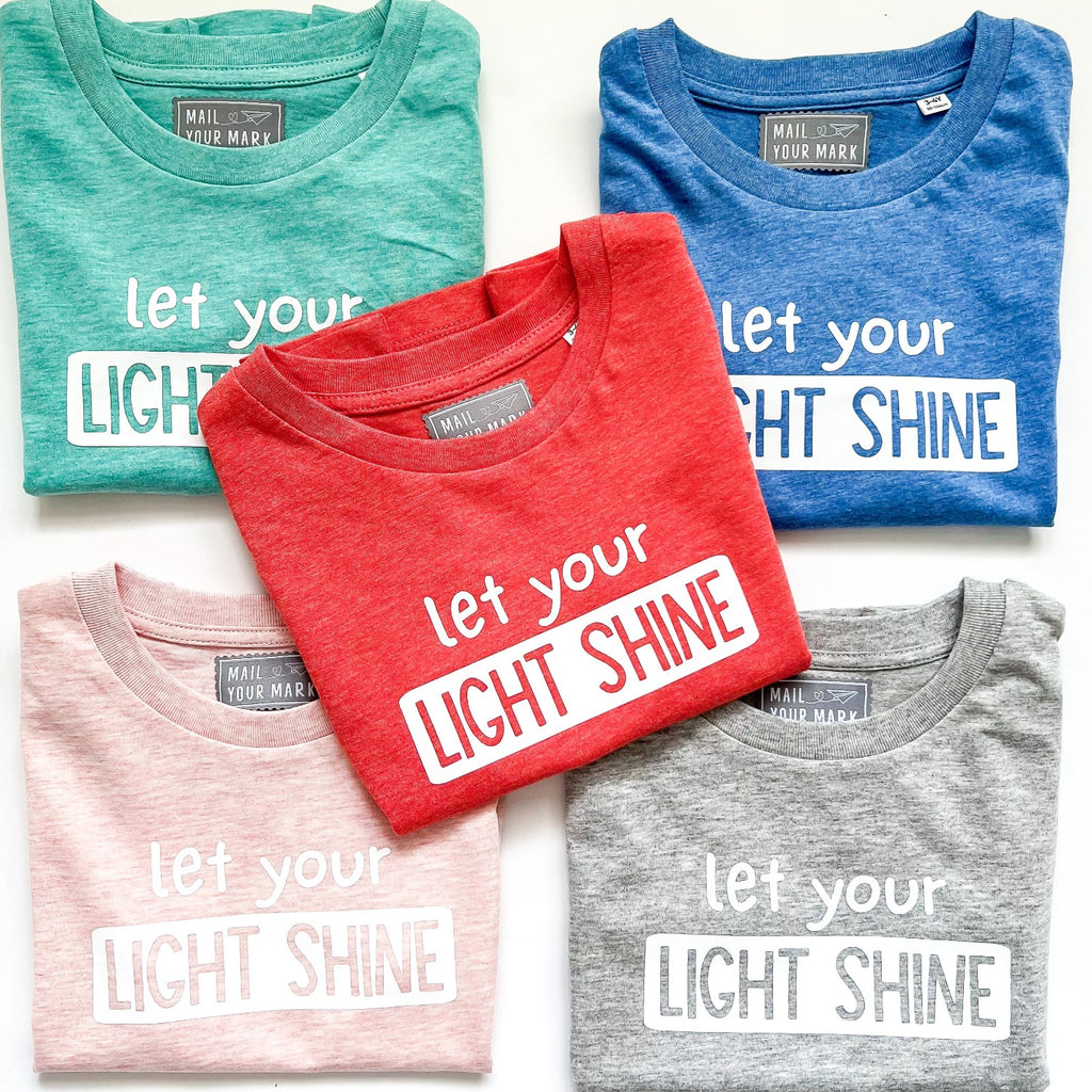 Let Your Light Shine Kids T-shirt. Comes in 5 different colors, printed on ultra soft organic cotton. 
